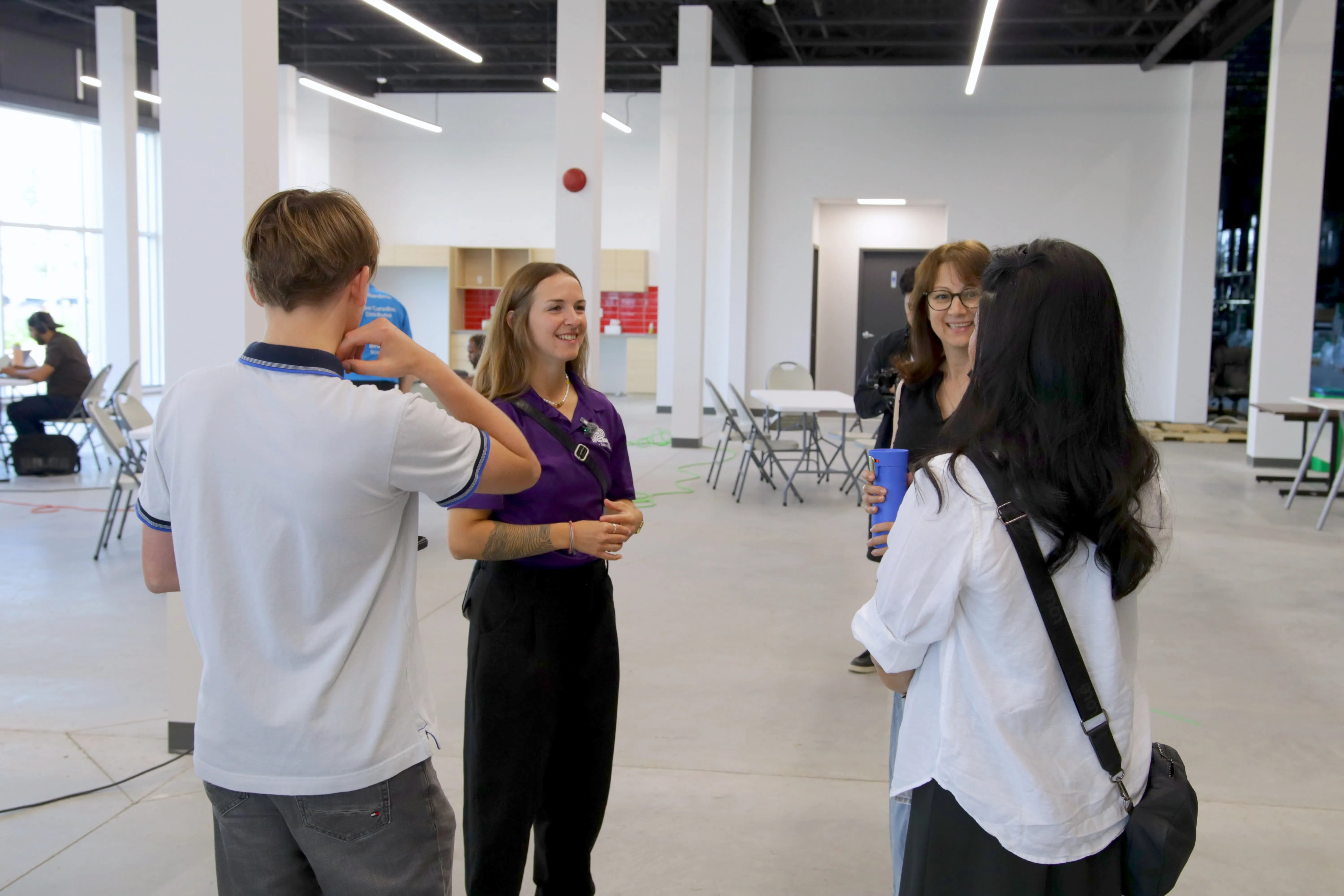 Attendees talking together at a Randmar event