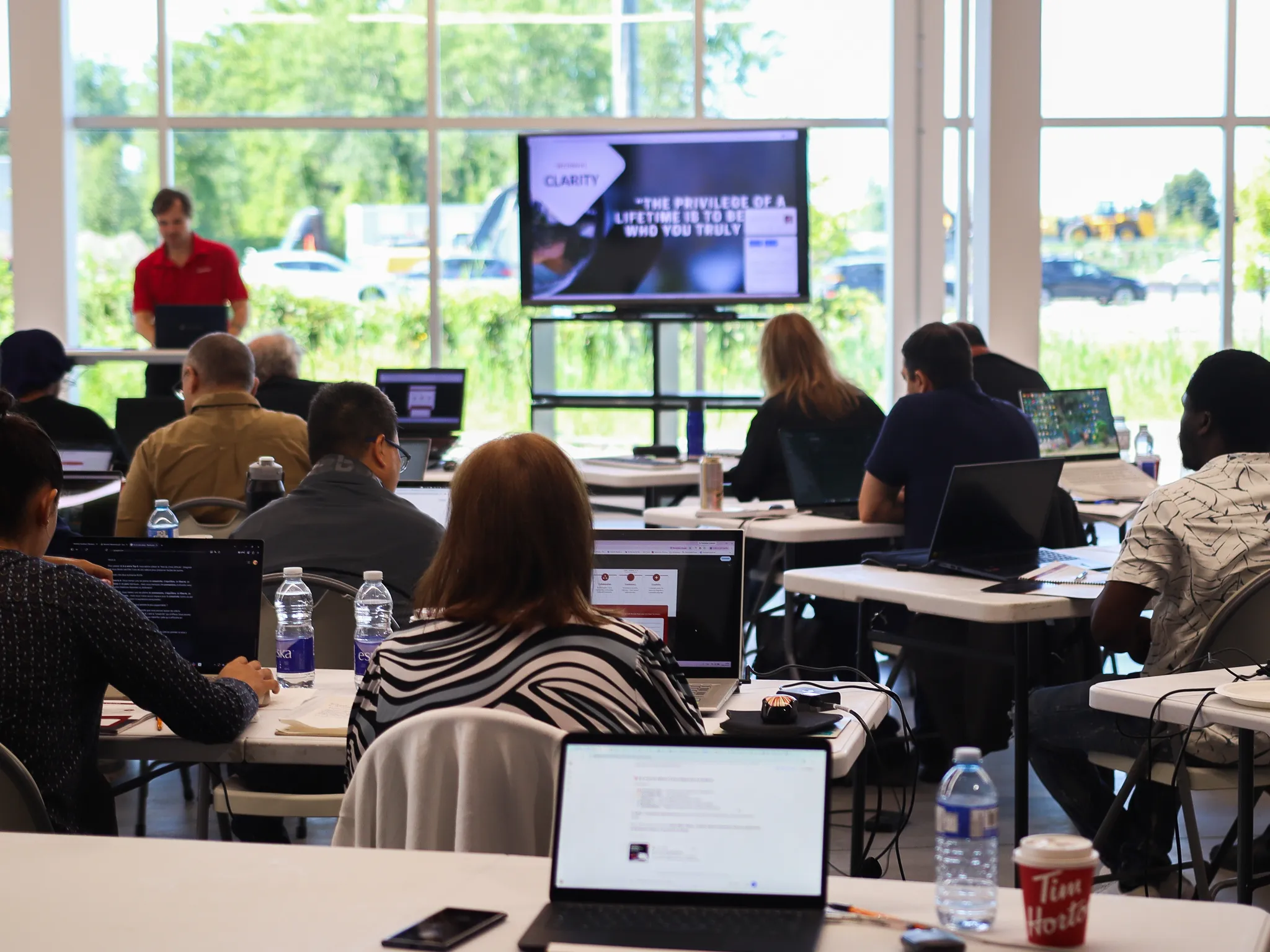 Attendees learning together during a Randmar conference presentation